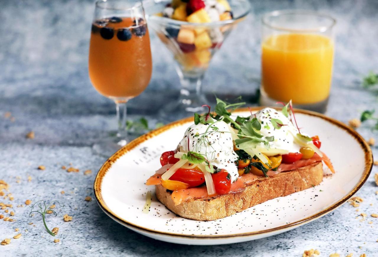 Oasia Resort Sentosa By Far East Hospitality Сингапур Экстерьер фото Poached eggs on toast
